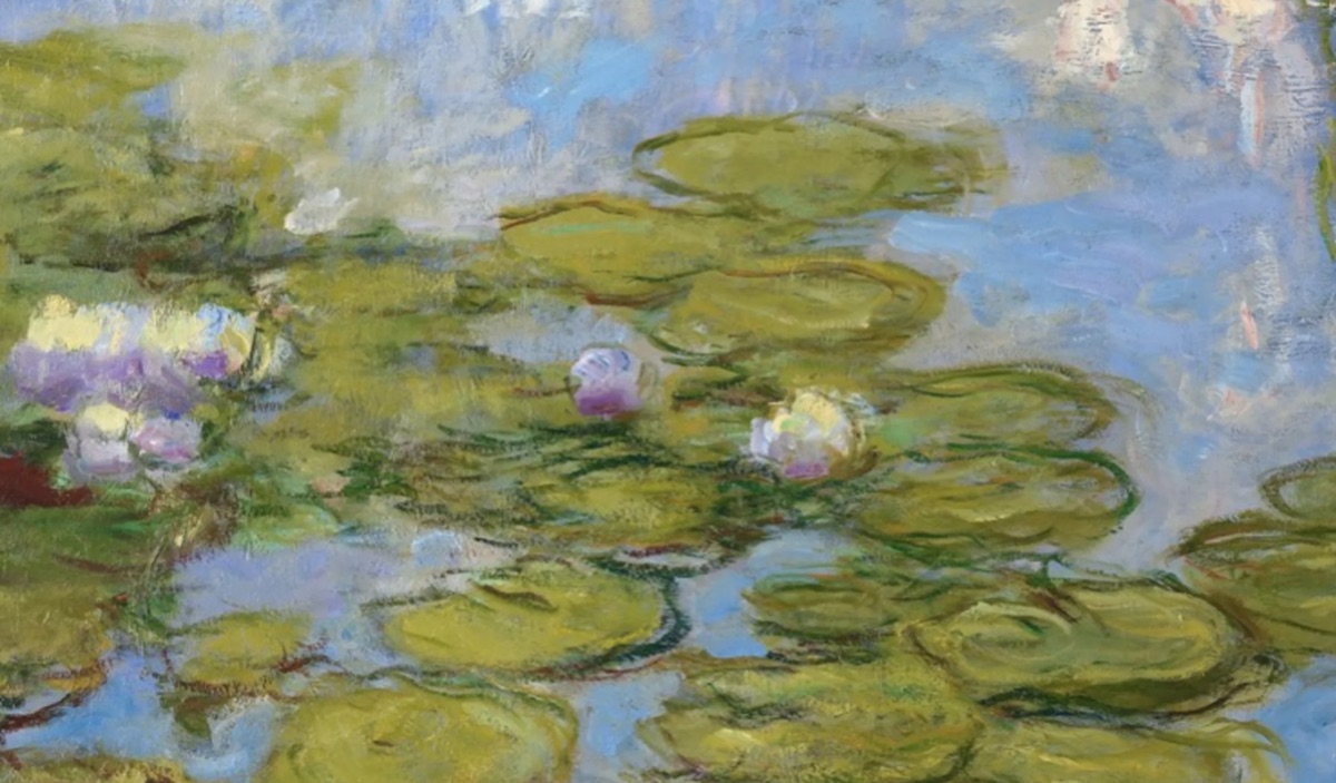 Detail of an Impressionist painting of water lilies: pink and white flowers among green pads on blue water