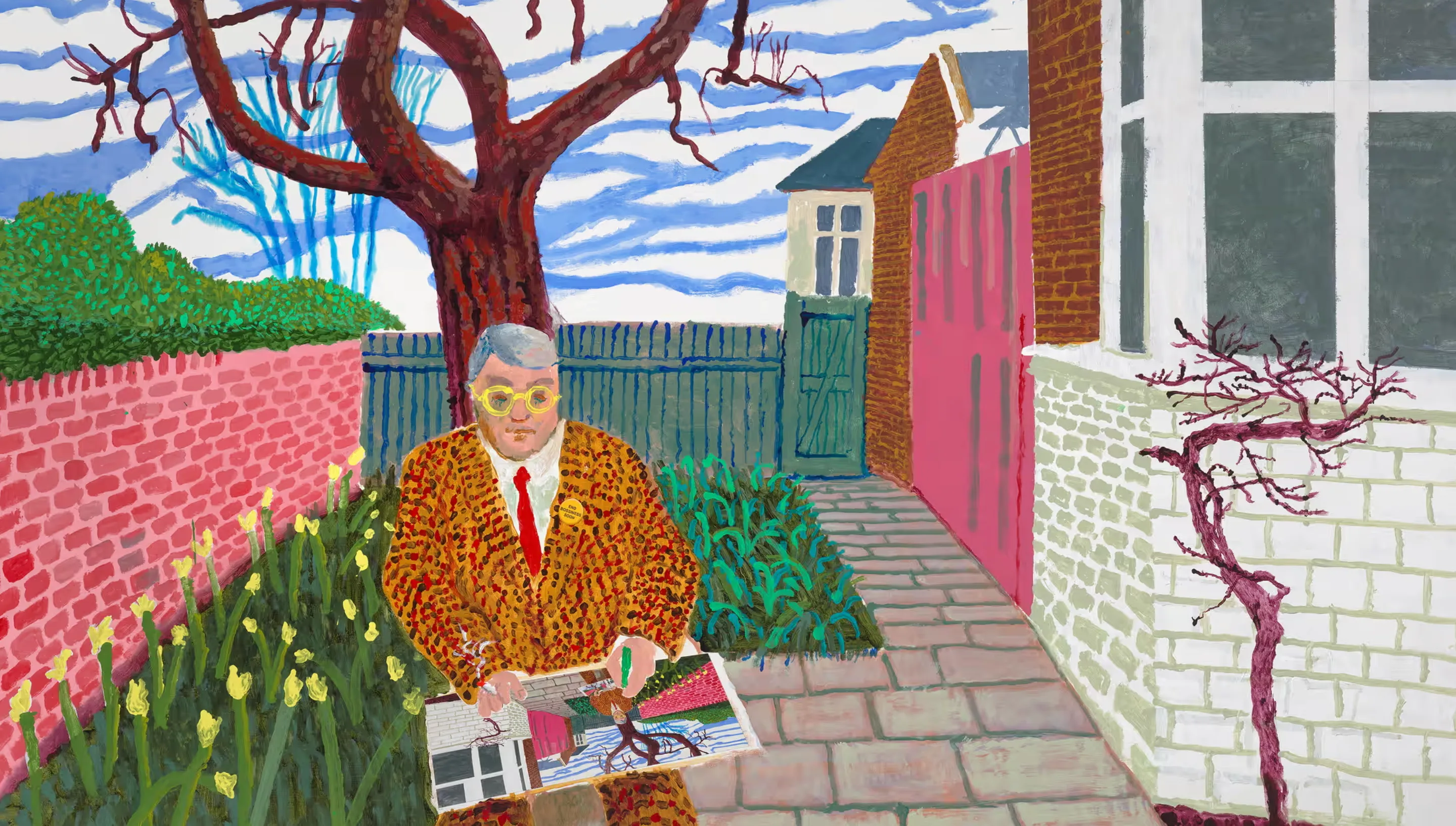 A David Hockney self-portrait in flat, bright colour: the artist in a leopard-print jacket seated in a walled garden, holding one of his own paintings