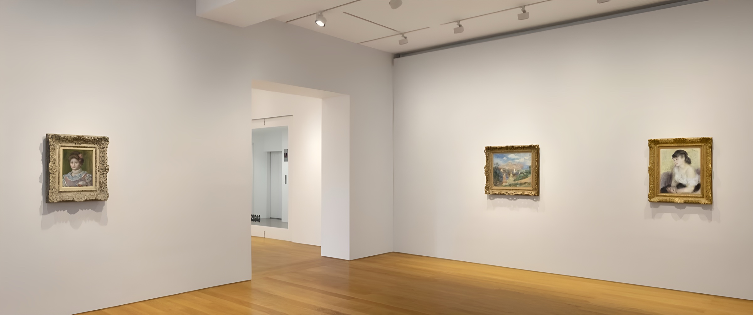 Installation view of framed paintings in the gallery